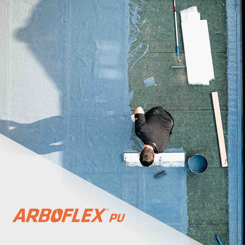 Contractor installing arboflex liquid waterproofing system over existing felt roof