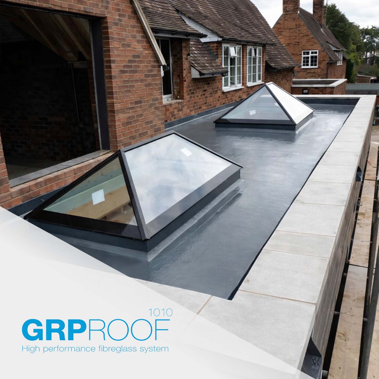 grp roof 1010 fibreglass roofing system fitted onto a new build home extension with a flat roof with 2 flat roof lanterns 