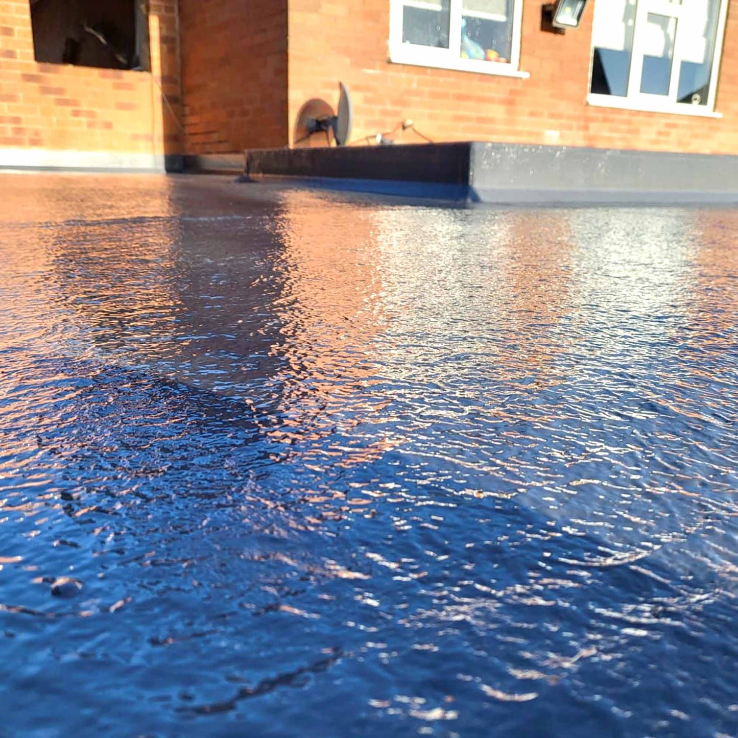 close up of flexitec grp roofing system installed on a flat roof