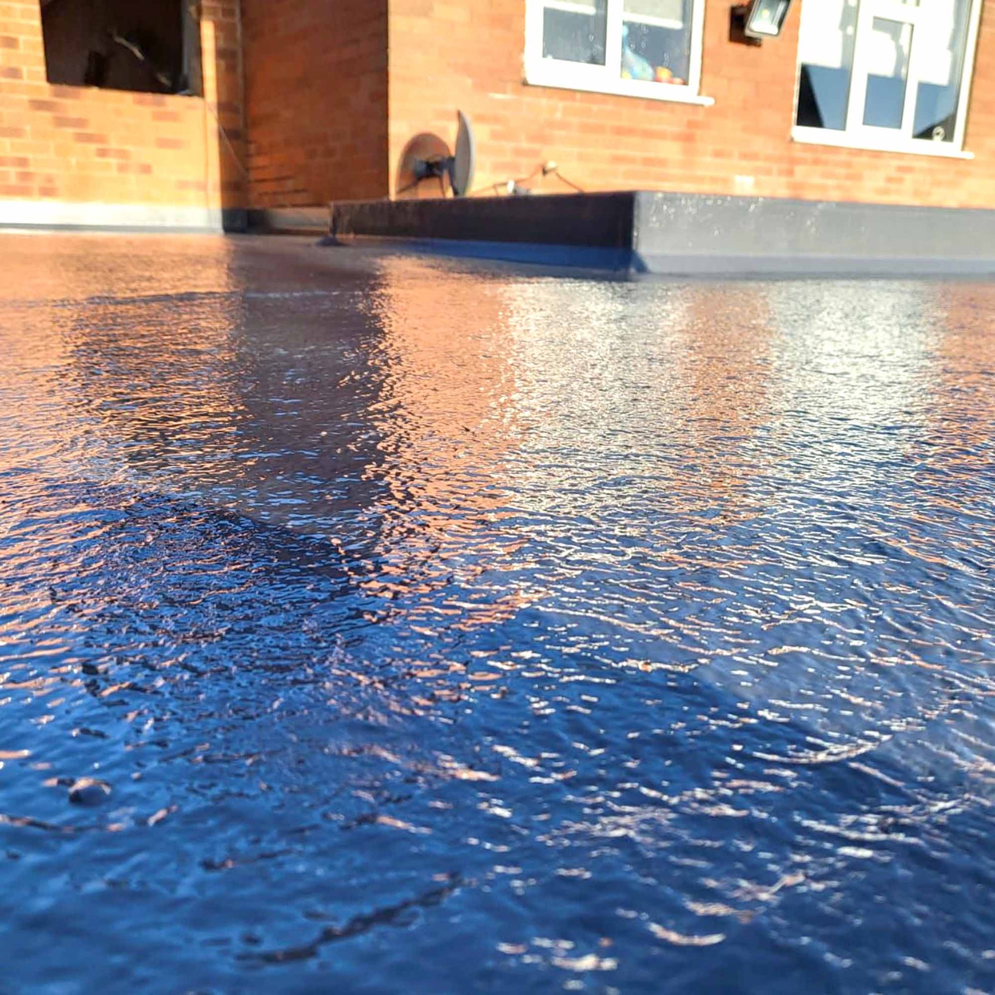 close up of flexitec grp roofing system installed on a flat roof