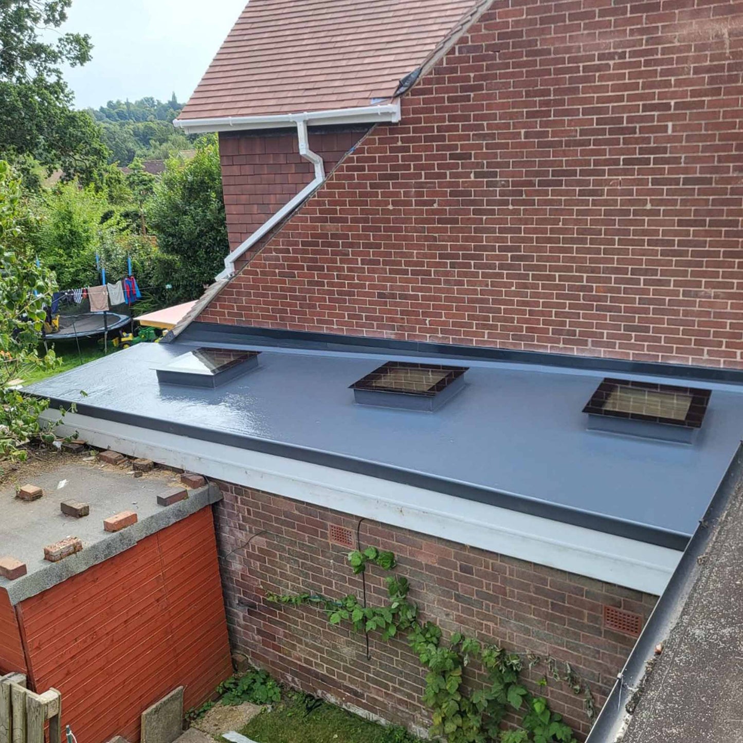 flat roof with skylights waterproofed with flexitec grp flat roofing system