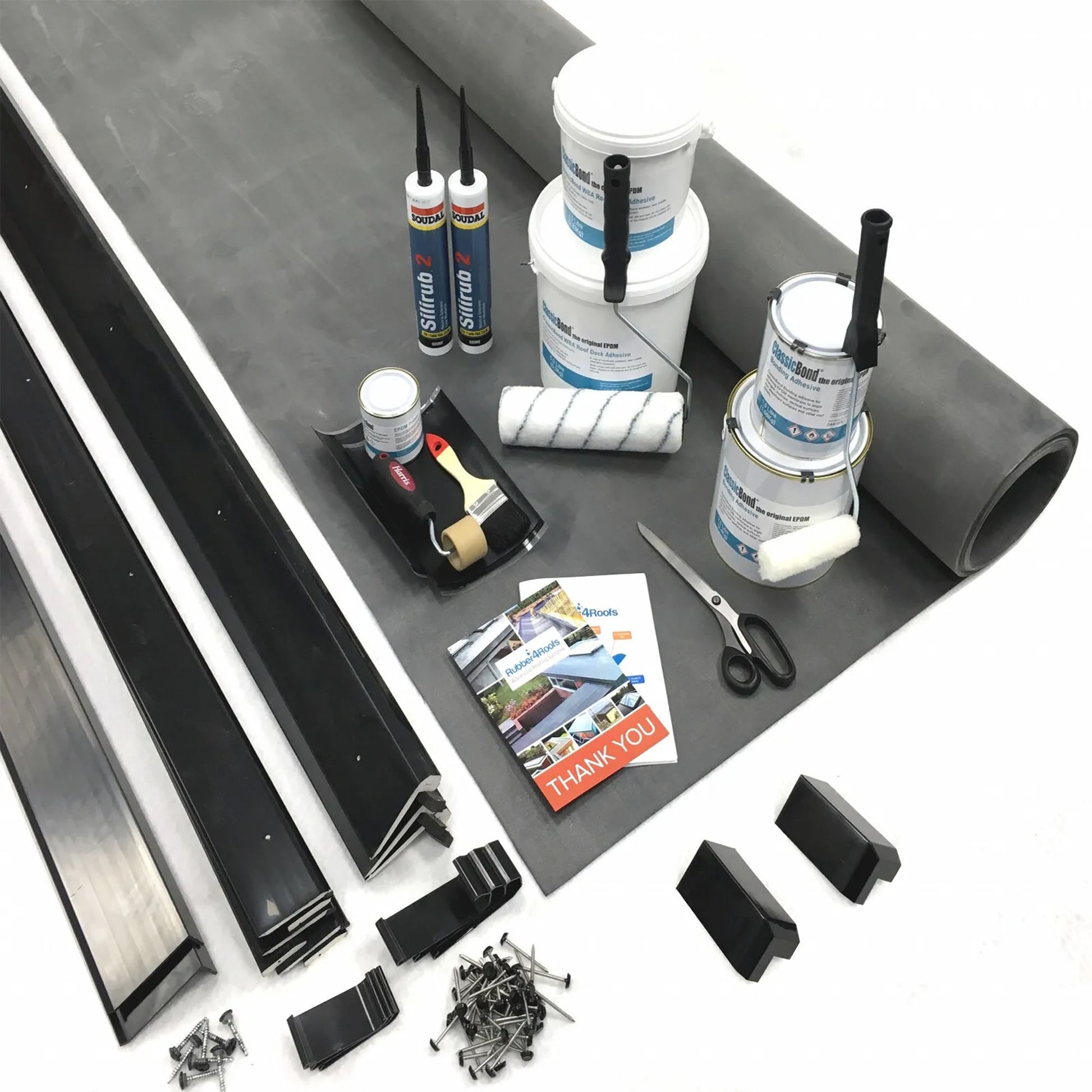 Collection of Materials and Tools That Combined Makes A Complete EPDM Rubber Roofing Kit for Flat Roofs