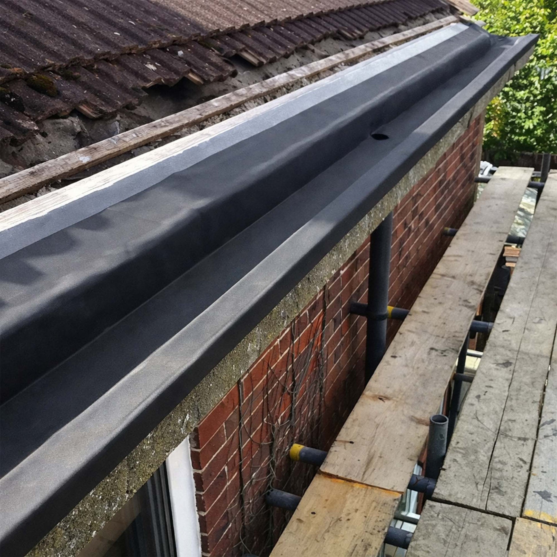 Finlock gutter on a residential property lined with Resitrix SKW self adhesive EPDM