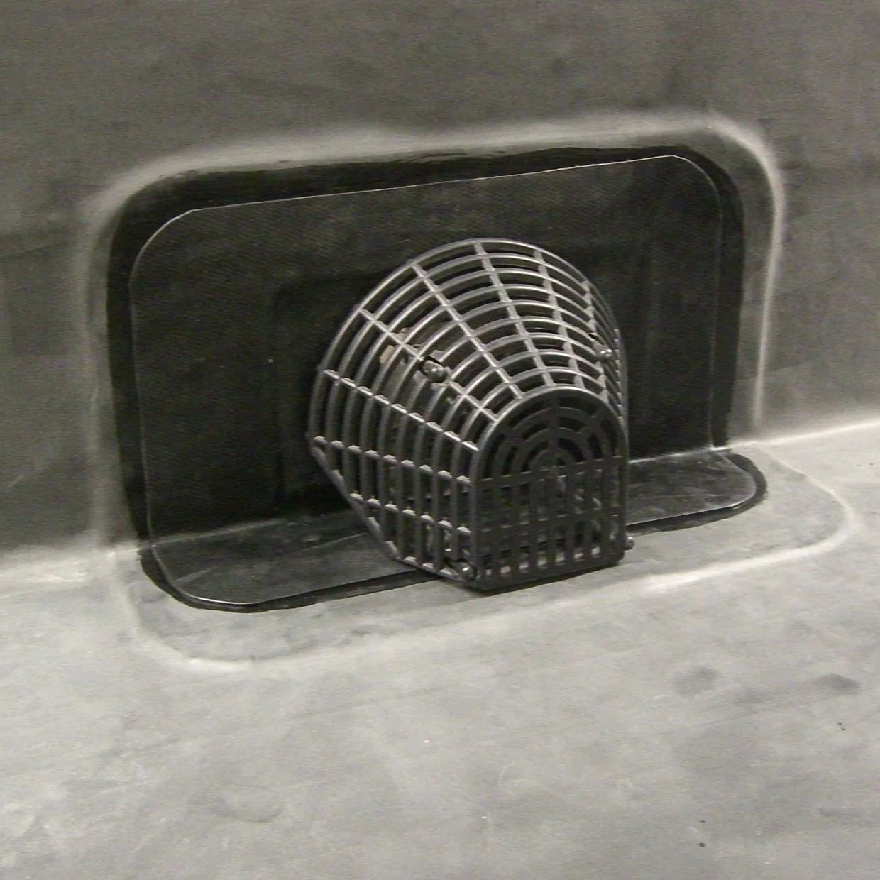 horizontal drain outlet for epdm rubber roofing fitted into parapet wall 