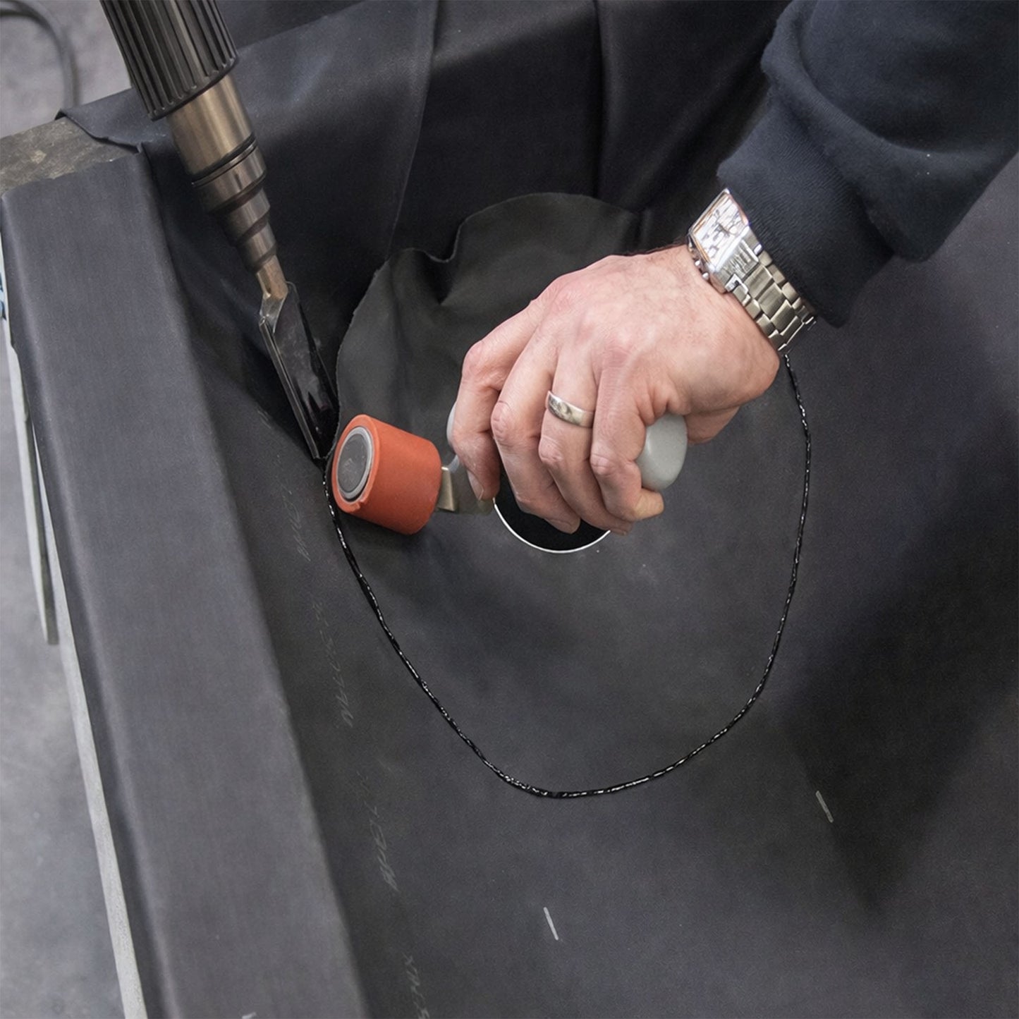 resitrix internal drain outlet flange being welded to the surrounding, pre-installed Resitrix EPDM membrane