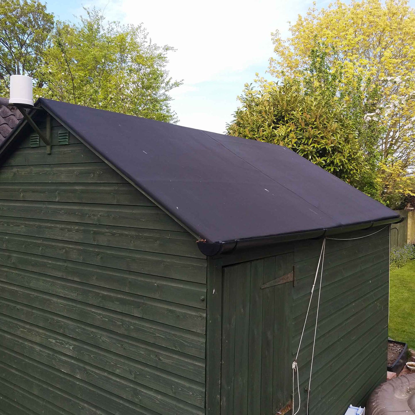 garden shed with skyguard epdm rubber roof kit fitted on the roof