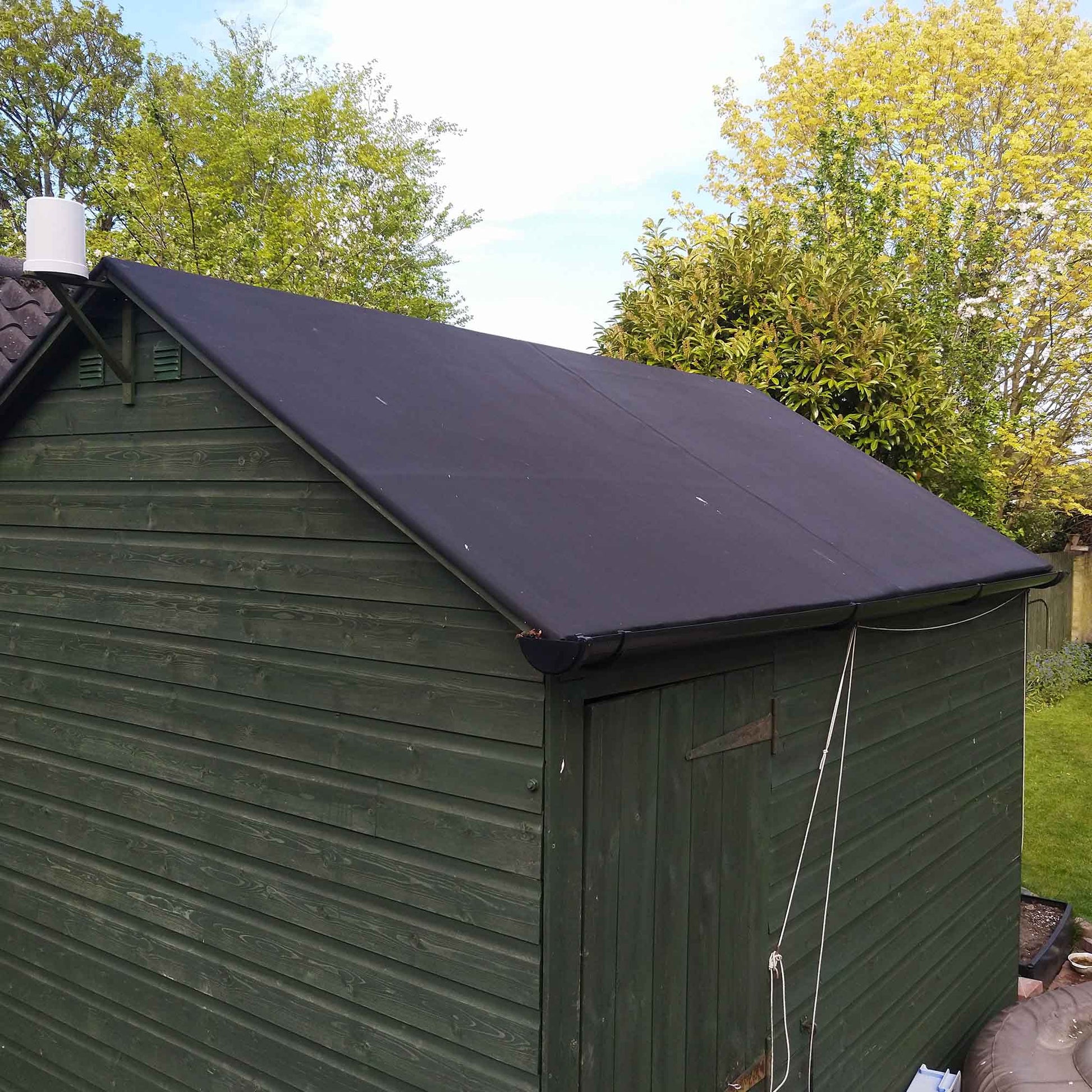 garden shed with skyguard epdm rubber roof kit fitted on the roof